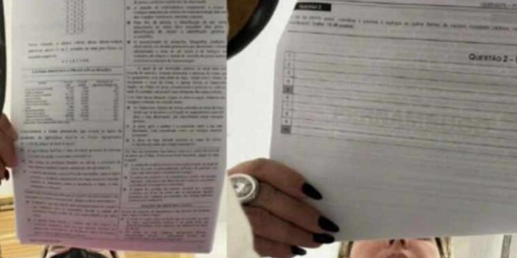 Mariana Abreu Andrade Cirilo fotografando as provas