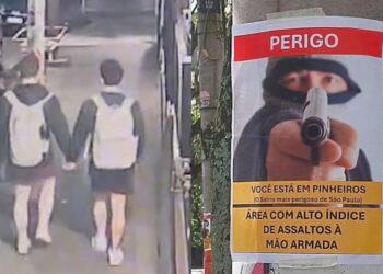 Cartaz alertando sobre a violência no bairro